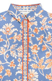 Floral patterned shirt with orange and white details on a blue background